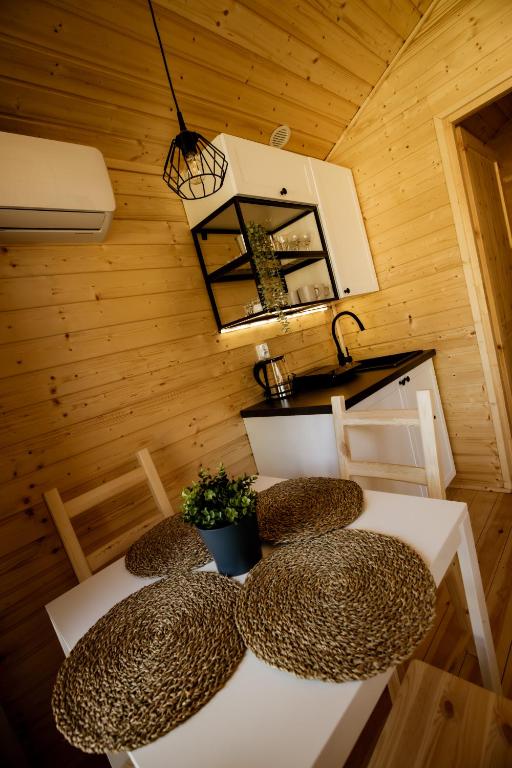 Postel nebo postele na pokoji v ubytování Osada Zator Family Resort & SPA