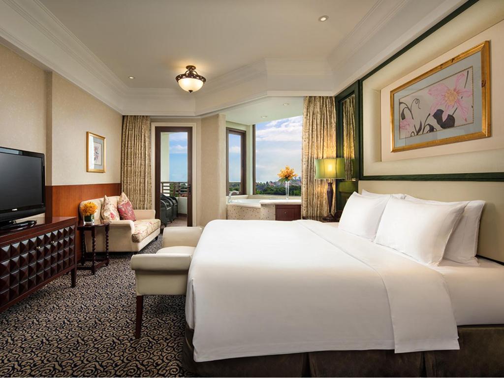 Postel nebo postele na pokoji v ubytování Seaview Resort Xiamen