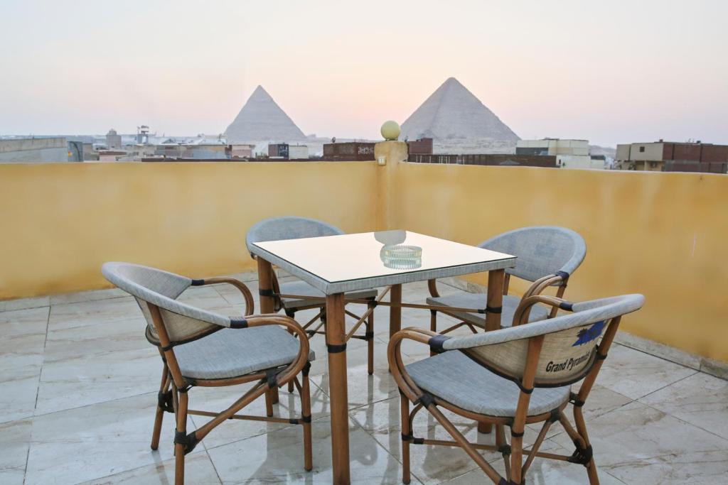 Balkón nebo terasa v ubytování Grand Pyramid View Hotel