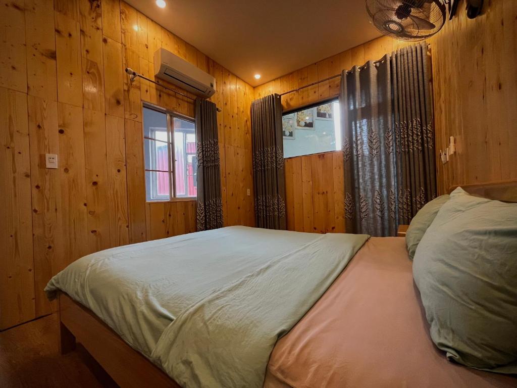 Voodi või voodid majutusasutuse Little Home Homestay toas