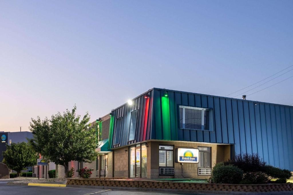 a building with colorful panels on the side of it at Days Inn by Wyndham Winchester in Winchester