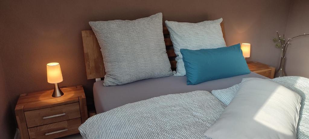 Кровать или кровати в номере Gästezimmer Waldblick Leinsweiler