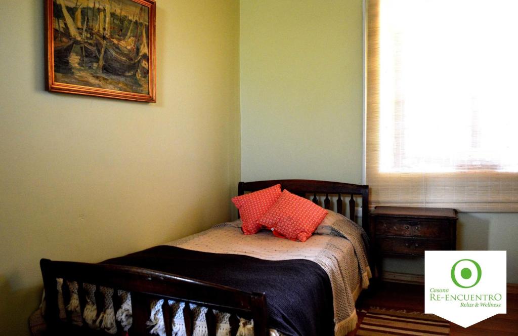 Postel nebo postele na pokoji v ubytování Casona Re-encuentro