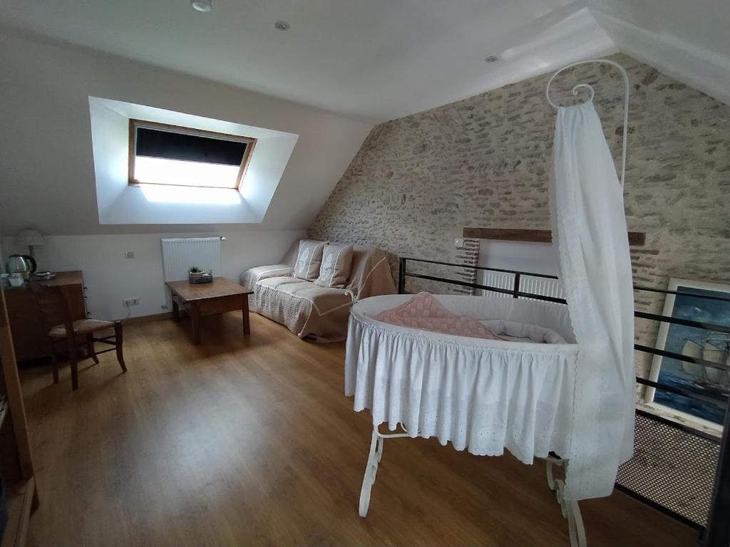 Postel nebo postele na pokoji v ubytování Les Ormeaux