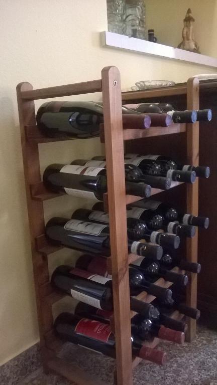 Palanda nebo palandy na pokoji v ubytování Locanda Genzianella