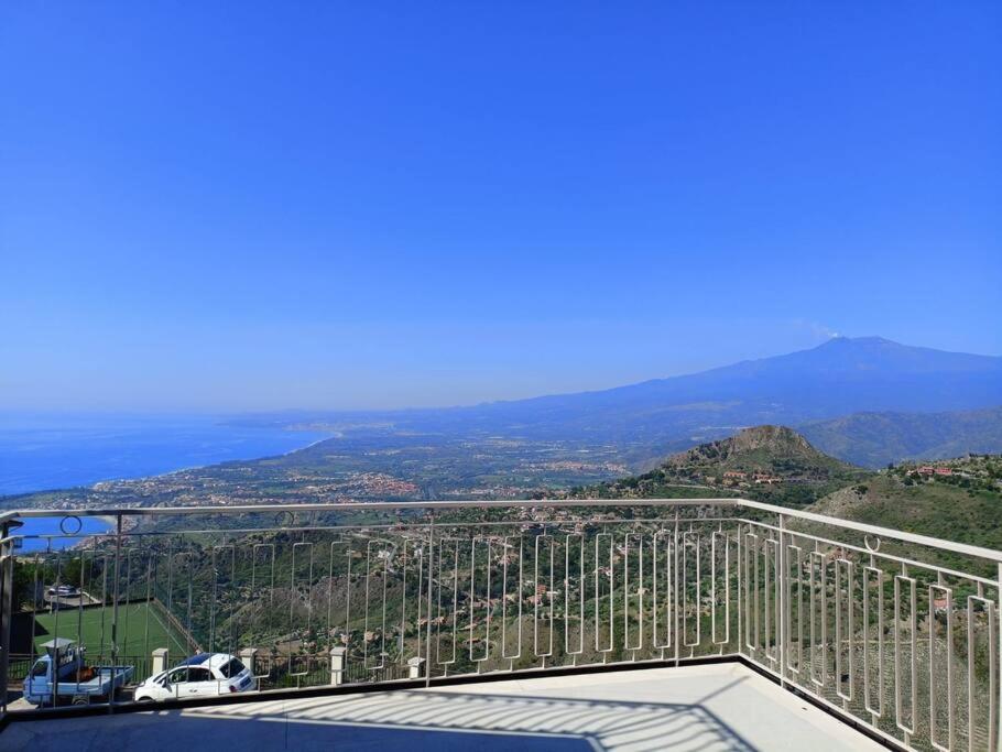 a view from the top of a building with a mountain at Stanza Mylai Etna View in Castelmola