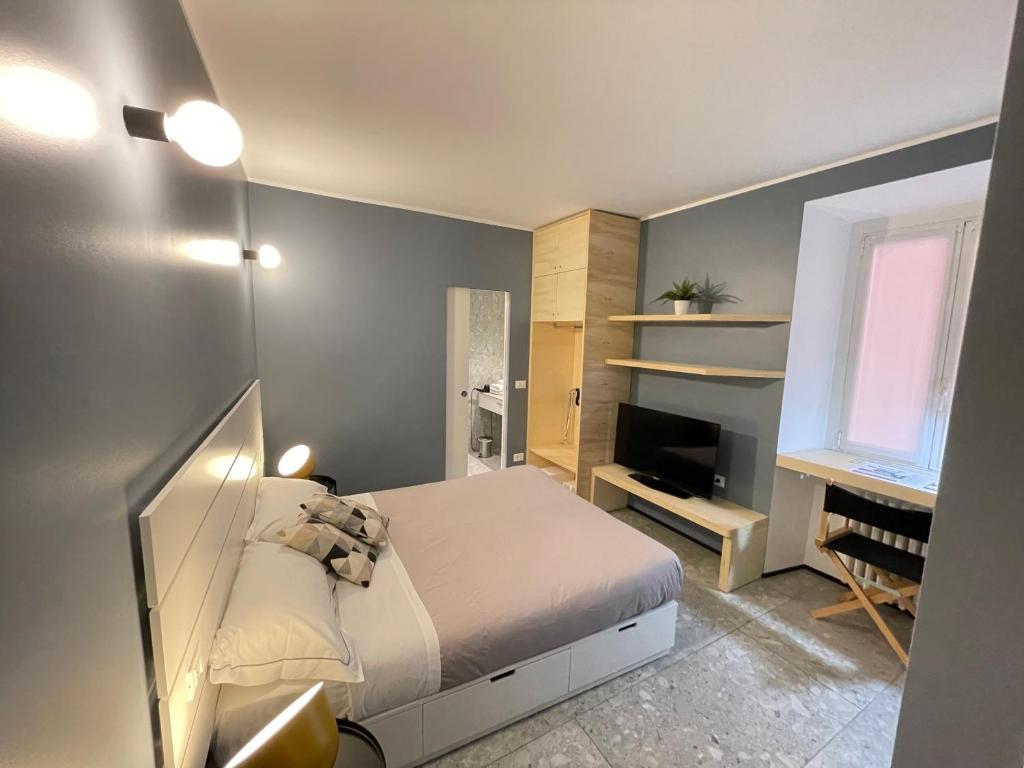 Postel nebo postele na pokoji v ubytování Torino48 Guesthouse