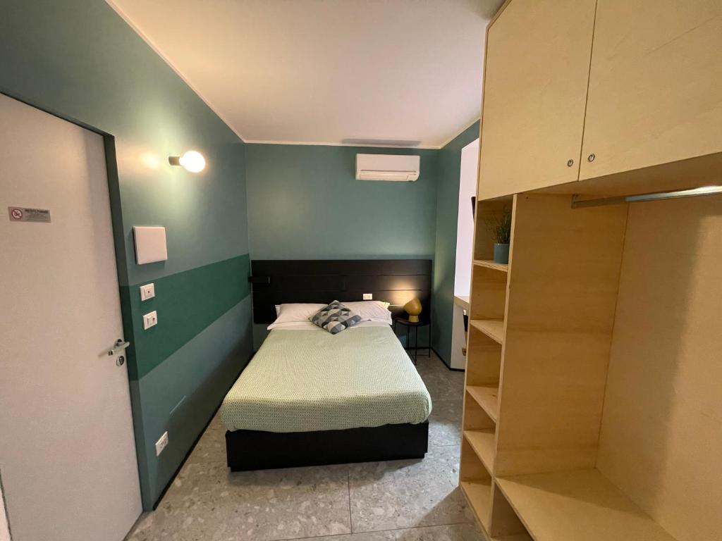 Postel nebo postele na pokoji v ubytování Torino48 Guesthouse