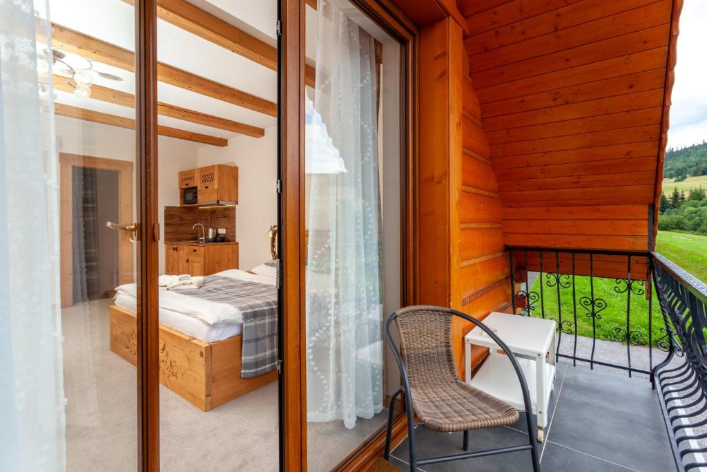 Postel nebo postele na pokoji v ubytování Drevenica u Pavla