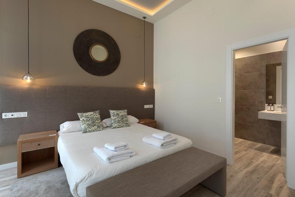 Posteľ alebo postele v izbe v ubytovaní Fresh Velazquez Apartments