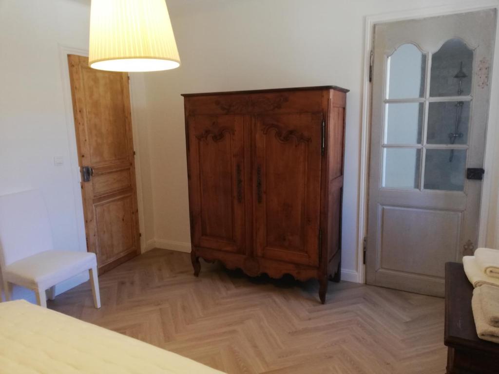 Postel nebo postele na pokoji v ubytování Les 3 Platanes