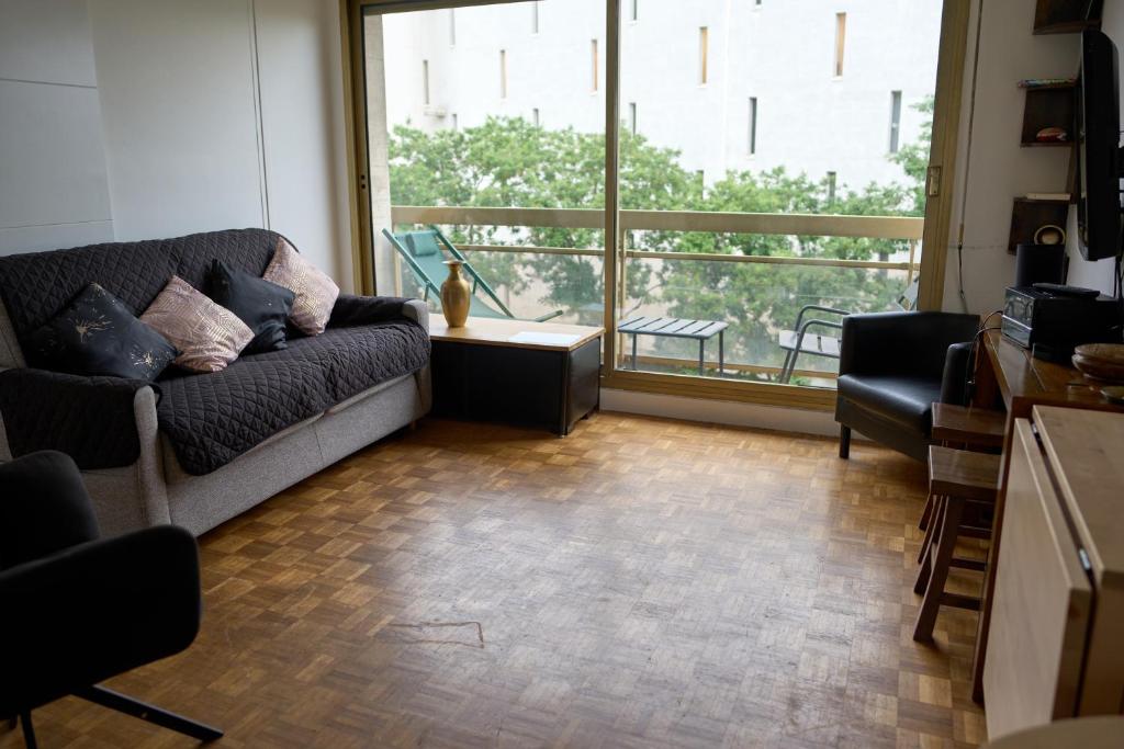 Entiry apartment, Private rooms in Paris tesisinde bir oturma alanı
