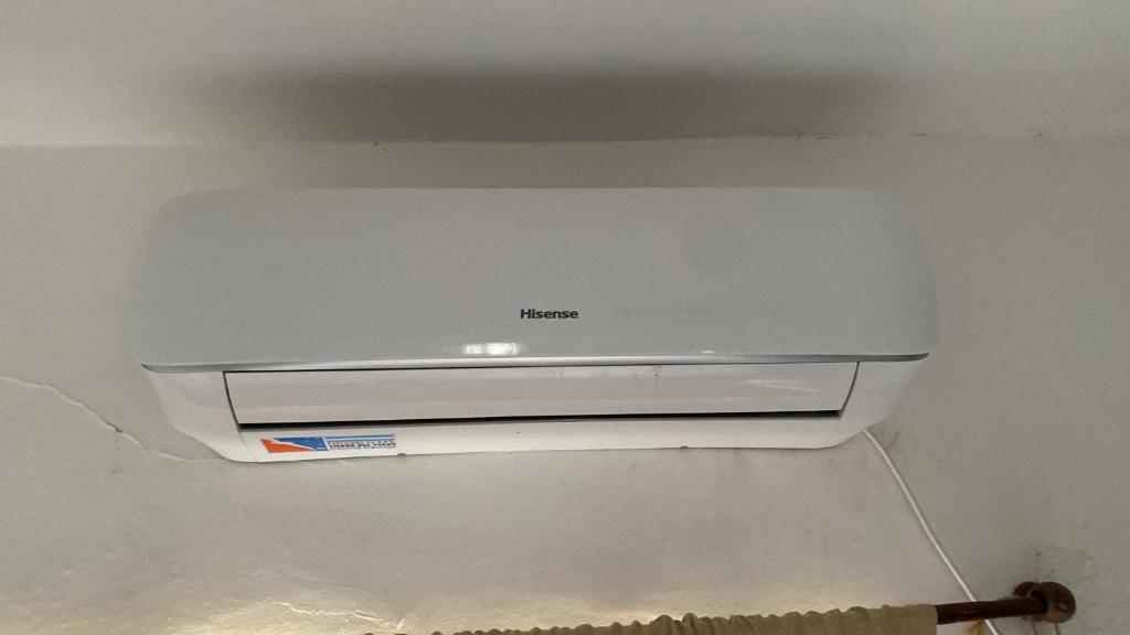 a computer printer sitting on top of a wall at La Escala in Corrientes