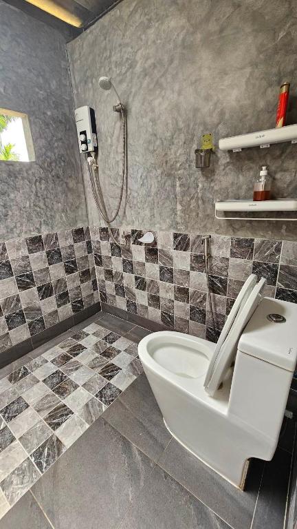 Koupelna v ubytování Baan Chi Homestay