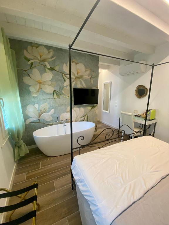 Postel nebo postele na pokoji v ubytování Star Soave Rooms - Locazione Turistica
