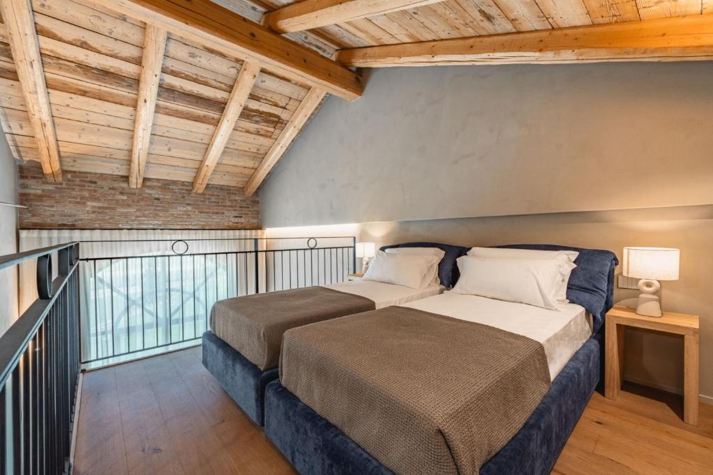 Krevet ili kreveti u jedinici u okviru objekta Monvì Wine Relais
