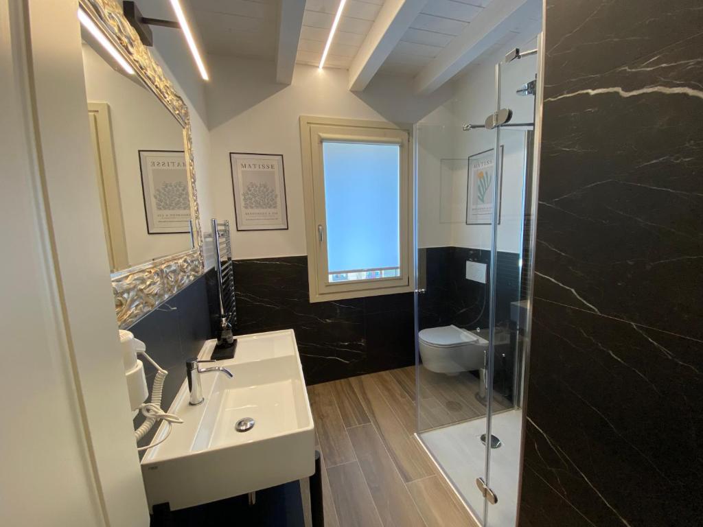 Koupelna v ubytování Star Soave Rooms - Locazione Turistica