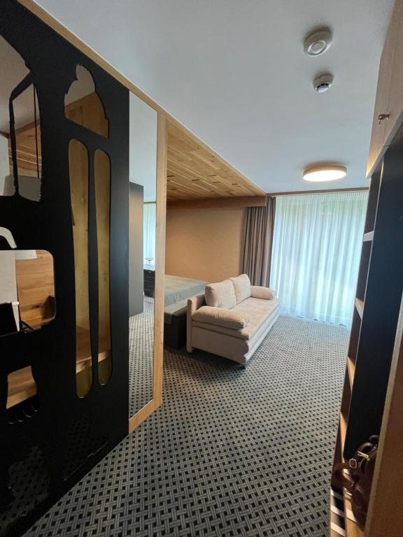 Postel nebo postele na pokoji v ubytování Rezidence Alpina