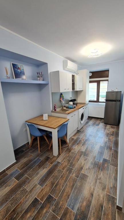 Kuchyň nebo kuchyňský kout v ubytování Apartament ultra central!