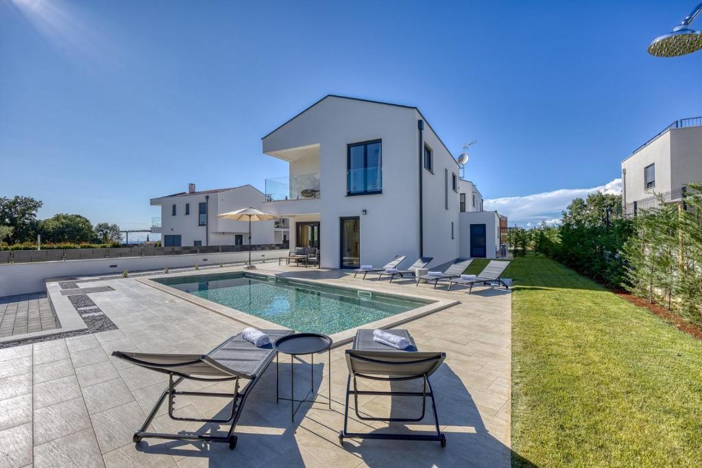 an image of a villa with a swimming pool at Villa Ivana with Private Pool in Nova Vas