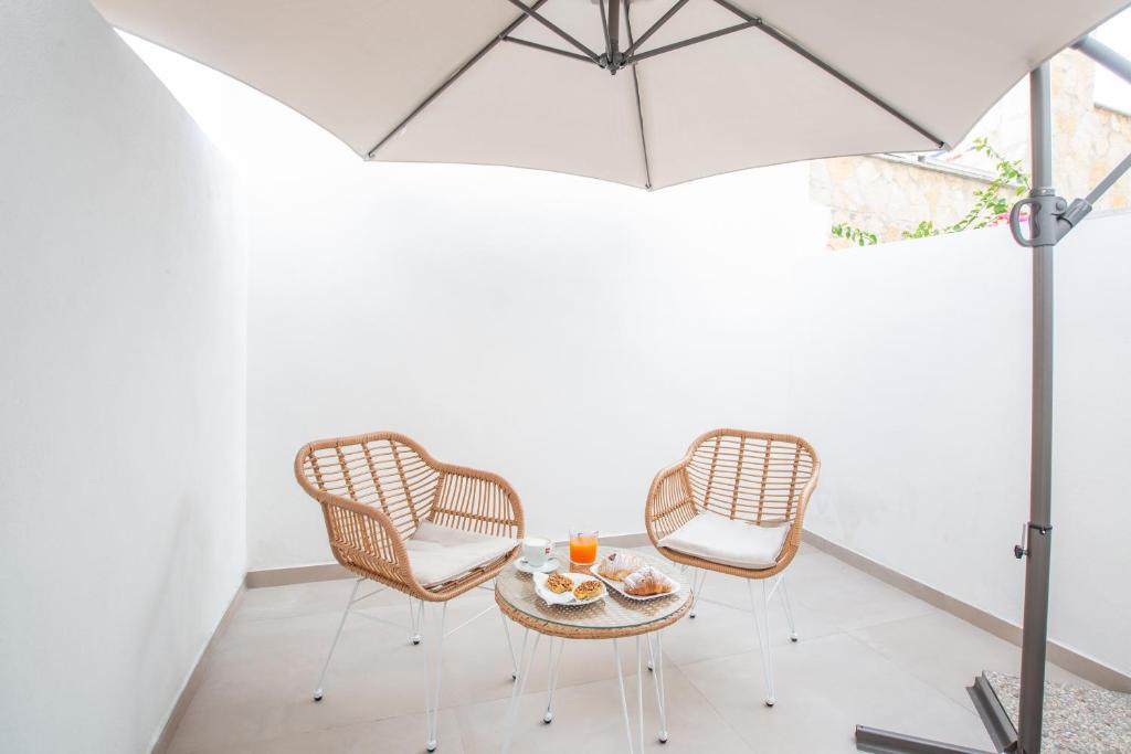 Posezení v ubytování Le Dune Luxury Rooms