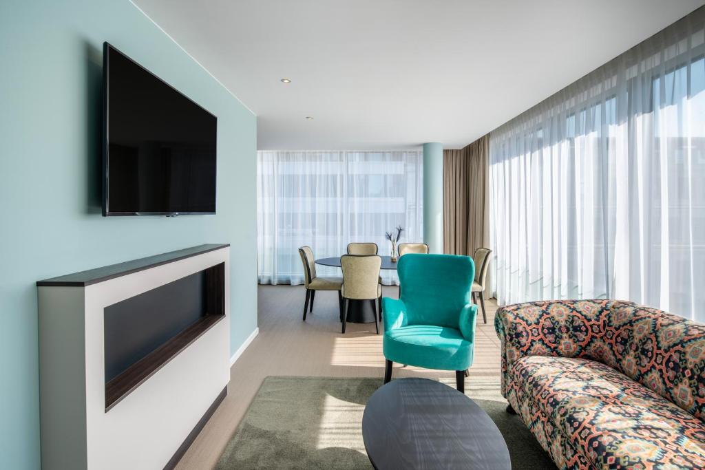 TV a/nebo společenská místnost v ubytování Thon Hotel EU