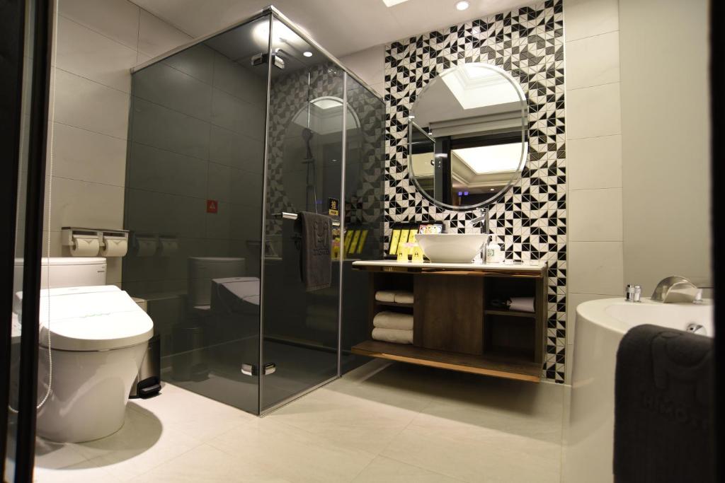 Koupelna v ubytování H Motel璽悅國際精品旅館
