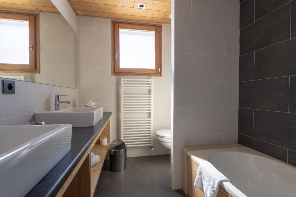 Koupelna v ubytování Chalet Les Rhodos