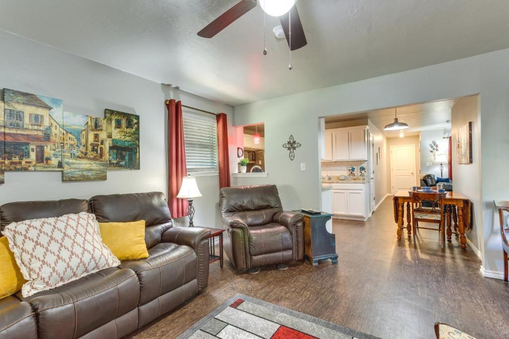 a living room with a leather couch and chairs at Cozy Norman Home 4 Mi to Oklahoma University! in Norman