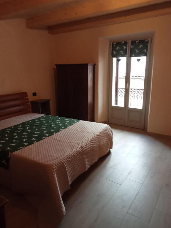 Postel nebo postele na pokoji v ubytování Casa DiBiLeo
