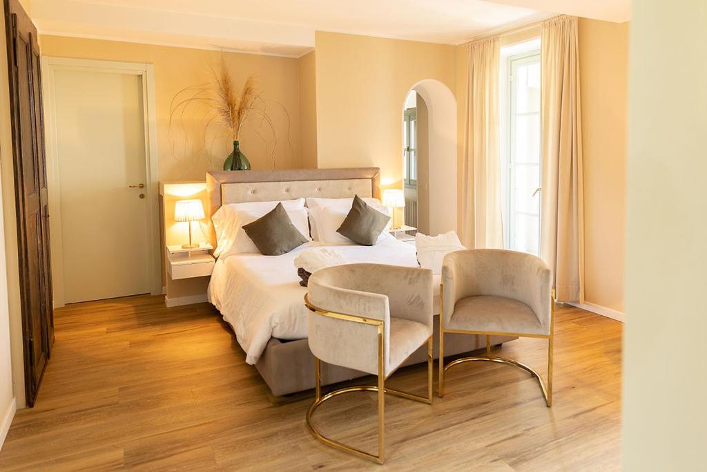 Postel nebo postele na pokoji v ubytování Villa Antica Colonia SPA & Wellness