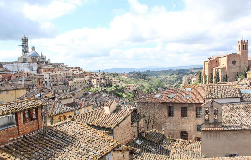 Nespecifikovaný výhled na destinaci Siena nebo výhled na město při pohledu z hotelu