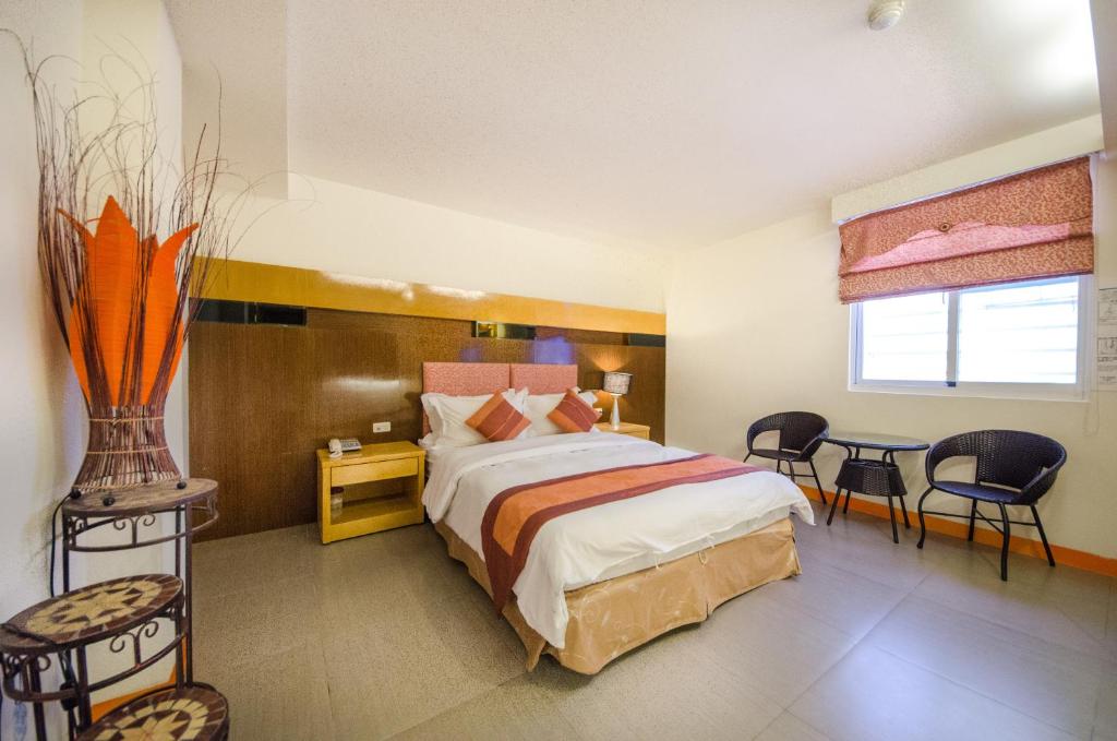 Postel nebo postele na pokoji v ubytování Yake Homestay