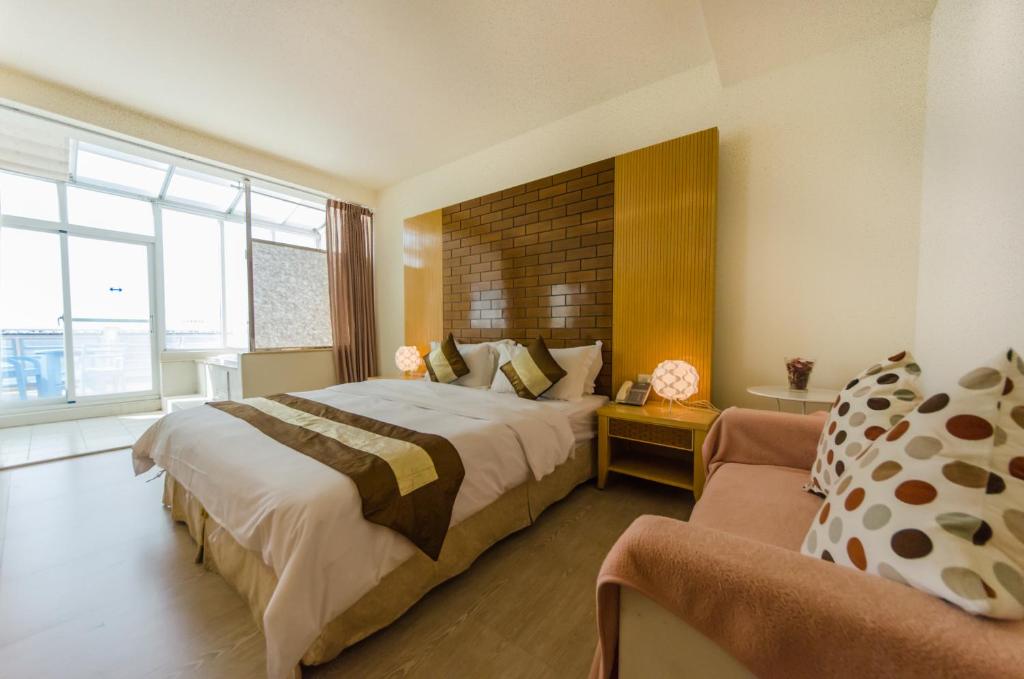 Postel nebo postele na pokoji v ubytování Yake Homestay