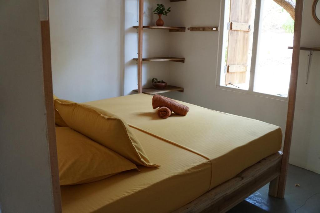 Postel nebo postele na pokoji v ubytování Hilltop Cabanas