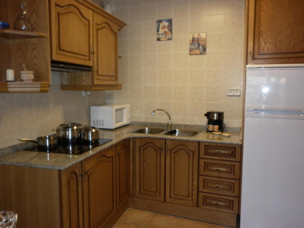 Kuchyň nebo kuchyňský kout v ubytování Casa Valentí