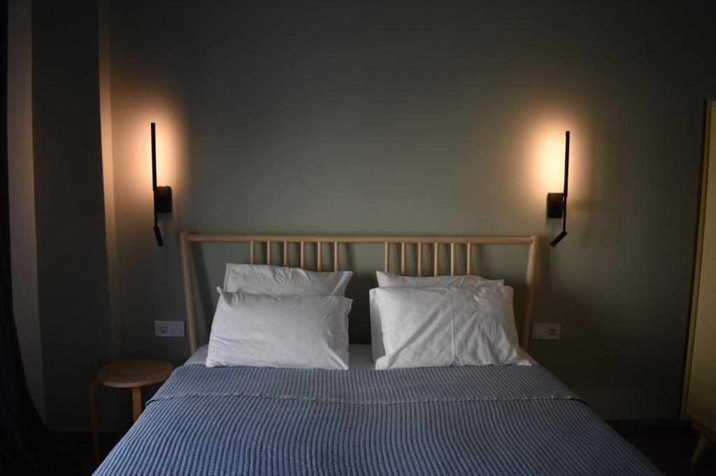 Postel nebo postele na pokoji v ubytování Ba & Bu Apartment 1