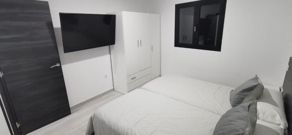 Postel nebo postele na pokoji v ubytování Situación inmejorable. Céntrico y tranquilo