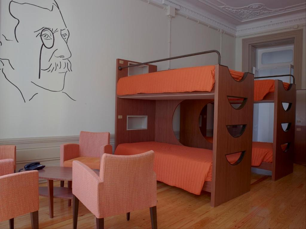 Uma área de estar em Serenata Hotel & Hostel Coimbra