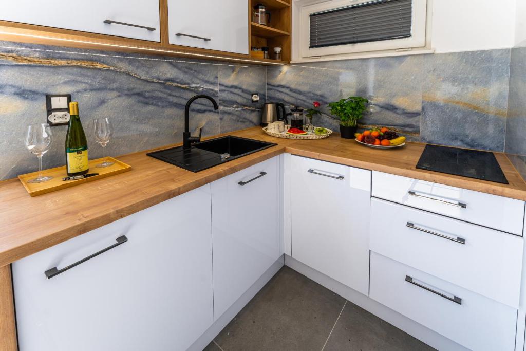Kuchyň nebo kuchyňský kout v ubytování Klif Resort Apartamenty