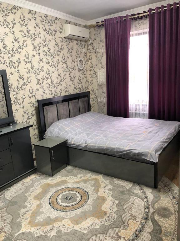 Кровать или кровати в номере Apartment.1