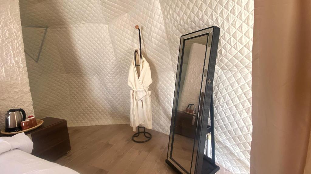 Postel nebo postele na pokoji v ubytování Jabal shams domes