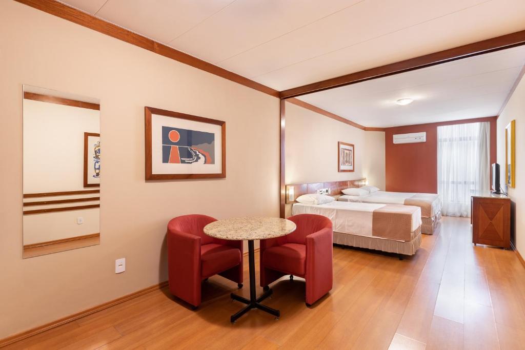 Postel nebo postele na pokoji v ubytování Hotel Crystal