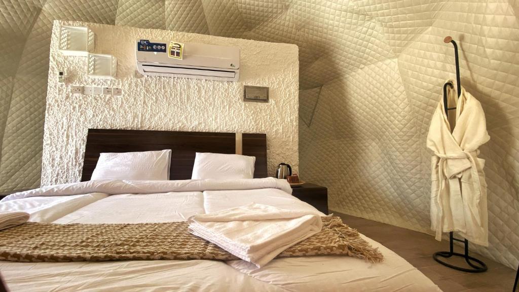 Postel nebo postele na pokoji v ubytování Jabal shams domes