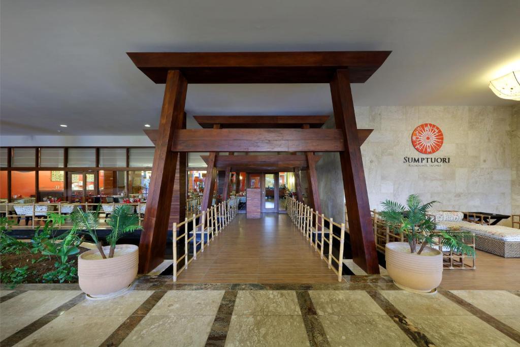 Restaurace v ubytování The Signature Level at Grand Palladium Imbassaí Resort & Spa