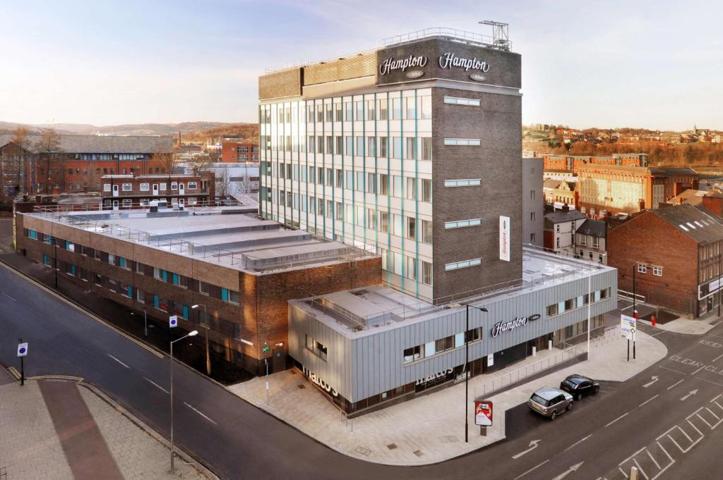 an overhead view of a large building with a street at Hampton by Hilton Sheffield in Sheffield