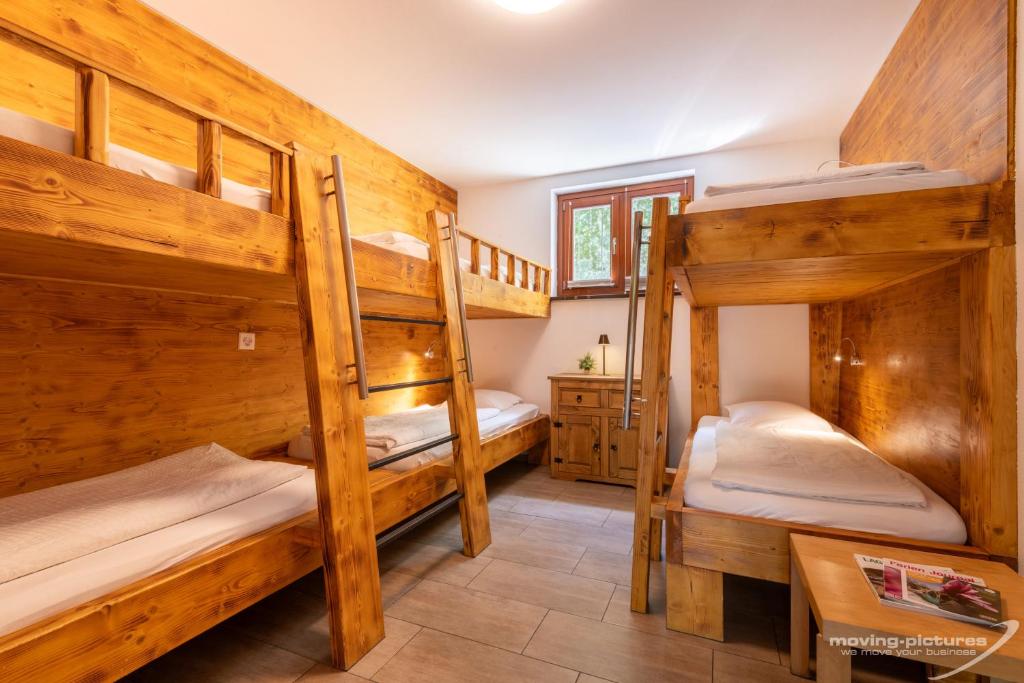 Postel nebo postele na pokoji v ubytování Bamboohouse Motel Riazzino