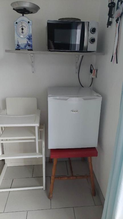 Kuchyň nebo kuchyňský kout v ubytování LA P'TITE MAISON