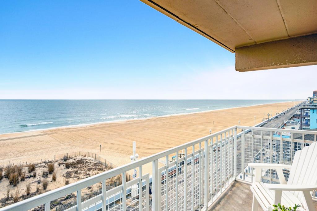 a balcony with a view of the beach at Dunes Suites Oceanfront in Ocean City