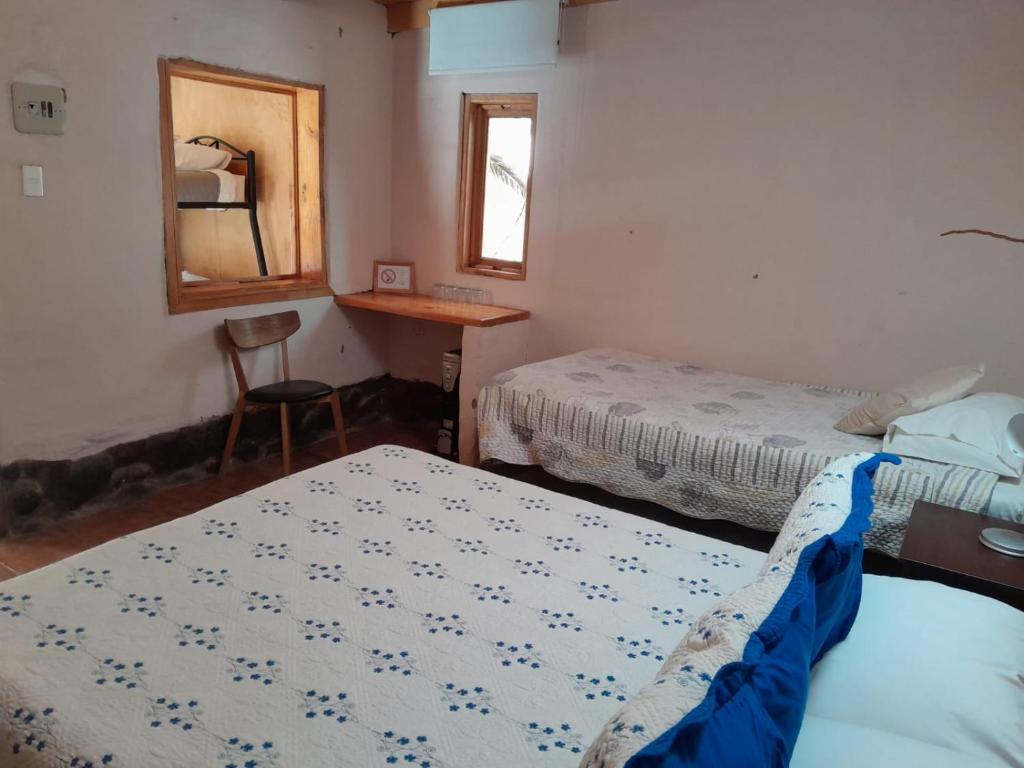 Voodi või voodid majutusasutuse Hotel-Camping Takha Takha toas